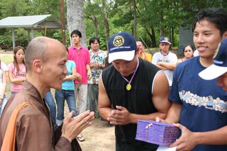 giving present - Dallas- Buddhist Youth Camp-06-2006.jpg